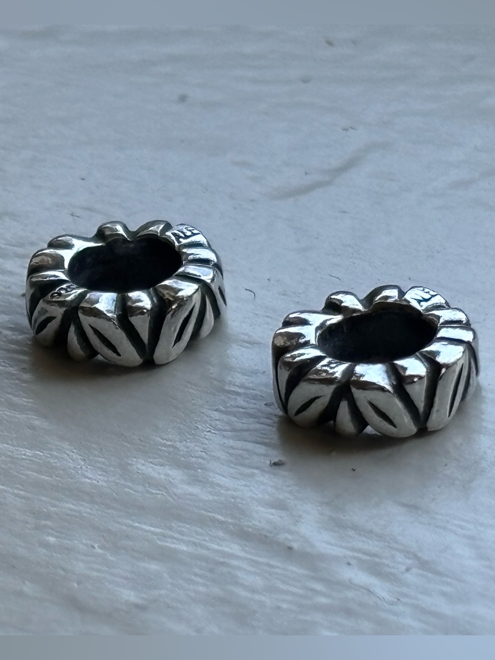 Pair of Retired vintage Pandora 925 Silver Leaf Patterned Spacer Bead
